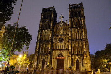 Fototapeta premium St Joseph's Cathedral is a old church in Vietnam. Its a late 19th-century Gothic Revival Neo-Gothic style church that serves as the cathedral of the Roman Catholic Archdiocese in old quarter city.
