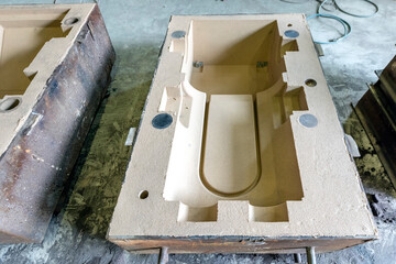 View of the sand mold for steel casting. Sand casting, also known as sand molded casting, is a...