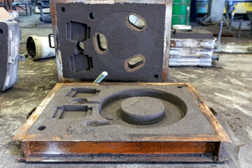 View of the sand mold for steel casting. Sand casting, also known as sand molded casting, is a...