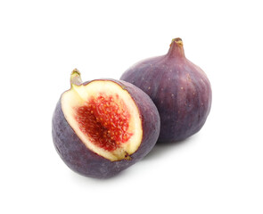 Whole and cut tasty fresh figs isolated on white