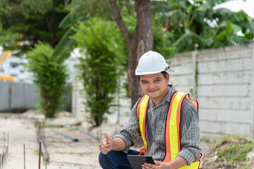 Man construction engineer at construction site