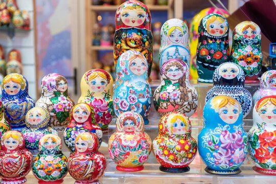 MOSCOW,RUSSIA - December 18, 2019: Set of chritmas wooden matrioshka dolls with russian balerinas on the shelf. traditional Christmas market.