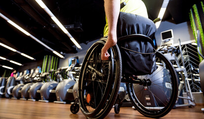 Fototapeta premium Disabled man training in the gym of rehabilitation center