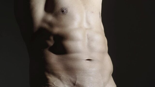 Sexy muscular man, male bare torso, closeup. Metrosexual mans naked. Shirtless hot naked guy.