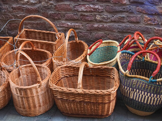 Colourful handmade woven shopping baskets on a street