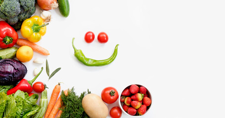 Fototapeta na wymiar Organic fresh vegetables and fruits frame on white background, top view, copy space 