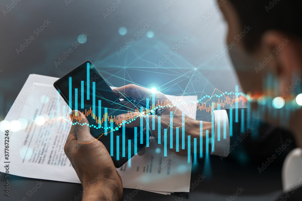 Poster trader in office working with smartphone, forex graph hologram to analyze market behavior, typing ph