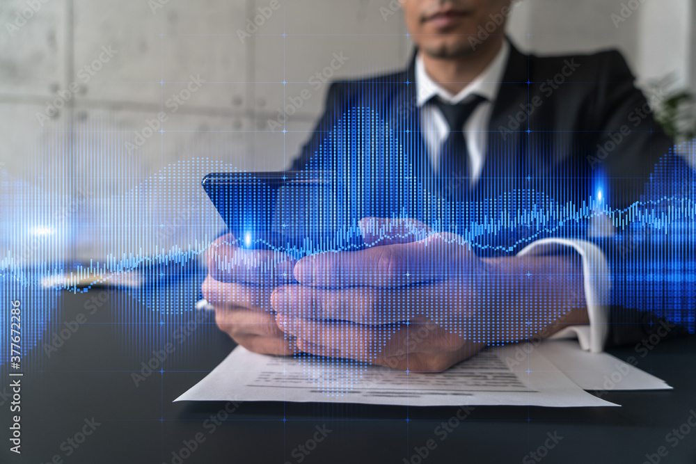 Poster trader in office working with smartphone, forex graph hologram to analyze market behavior, typing ph