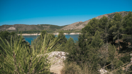 Fototapeta na wymiar Reservoir in the forest on the Ruta de las Caras