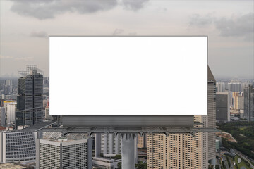 Blank white road billboard with Singapore cityscape background at sunset. Street advertising poster, mock up, 3D rendering. Front view. The concept of marketing communication to sell idea.