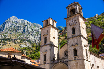Fototapeta na wymiar Old monastery in the European city of Kotor on the shores of the Adriatic sea against the backdrop of mountains