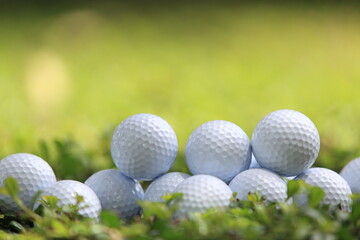 Golf ball on tee ready to be shot , for holiday season concept of golf course background