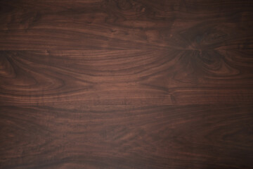 Texture of toned black walnut wood with oil finish