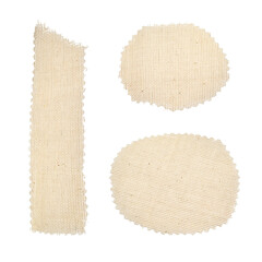 A set of round and long rectangular pieces of torn fabric, patches for clothes. Canvas texture with...