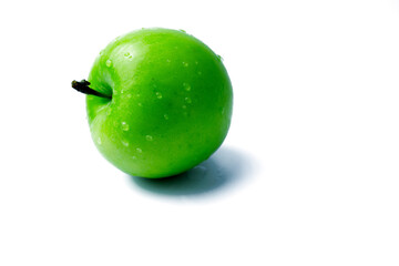 Fresh green apple and water drop on white background