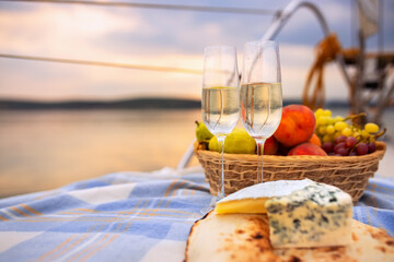 picnic on a yacht at sunset