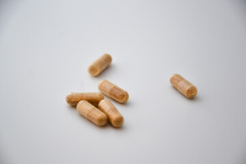Isolated natural pills on a white background