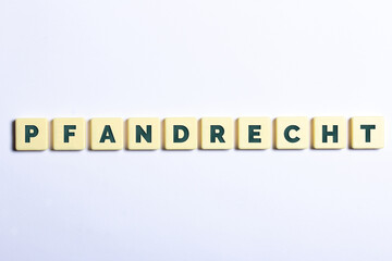 Das Wort Pfandrecht in Buchstaben auf weißem Hintergrund