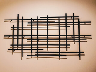 Group of steel stripes with shadow on the wall in the abstract concept idea design for wallpaper