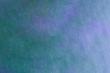 Grunge style teal painted fabric texture background with some scratches, stains, and dirt. Colorful abstract landscape.