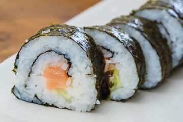 Sushi roll seafood rice fish, prepared tasty.