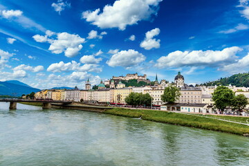 Fototapeta na wymiar Summer day in Salzburg town. Salzach river. Austria.