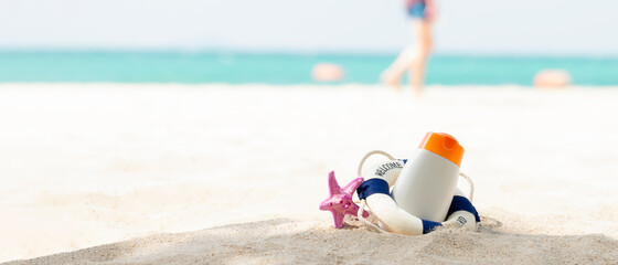 Sun box sandal slippers on sand at the beach
