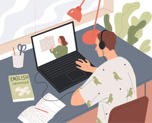 Student learns online, watching the lesson on the laptop screen.