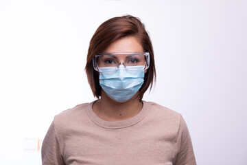 Doctor scientist or nurse portrait with facemask and protective glasses