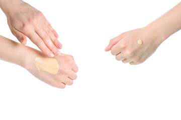Swatch  of foundation on the hand isolated on white.