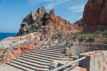 Sardinia Coastline: Typical Red Rocks and Cliffs near Sea in Arbatax; Italy