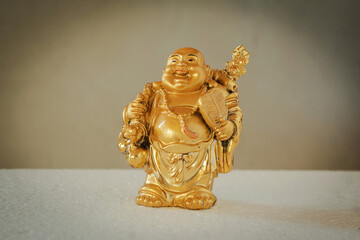 Buddha statuette. Meditative state of mind. Peace of mind and joy