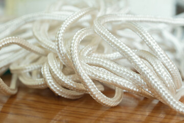 White laces. Charming and good for sneakers. Long and smooth