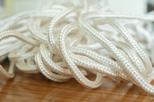 White laces. Charming and good for sneakers. Long and smooth