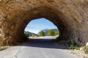 Stone tunnel in a rock in Montenegro