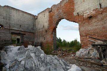 Fototapeta premium destroyed walls of an old brick building, ruins