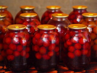 Preservation for the winter is in the pantry or cellar.Large glass jars with home preservation of...