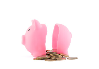 Halved pink piggy bank with coins on white background with clipping path