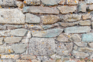 Old stone rock texture pattern. Natural stone wall tiles texture. Old rock rustic textured stone pattern wallpaper surface. Grunge stone wall marble antique rock texture history archaeological