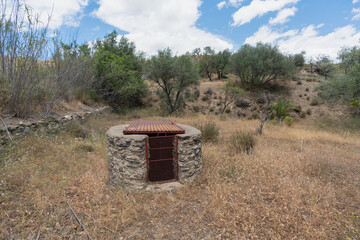 water well in an abandoned farm field