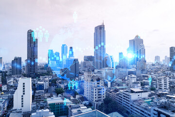 Obraz premium Social media icons hologram over panorama city view of Bangkok, Asia. The concept of people networking and connections. Double exposure.