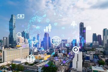 Fototapeta premium Social media icons hologram over panorama city view of Bangkok, Asia. The concept of people networking and connections. Double exposure.