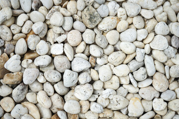 White bebbles stone or river stone  background with vintage filter 