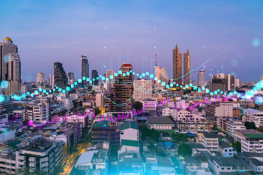 Glowing FOREX graph hologram, aerial panoramic cityscape of Bangkok at sunset. Stock and bond trading in Asia. The concept of fund management. Double exposure.