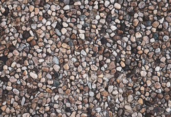 Background image of cement mixed with pebbles Matt red filter