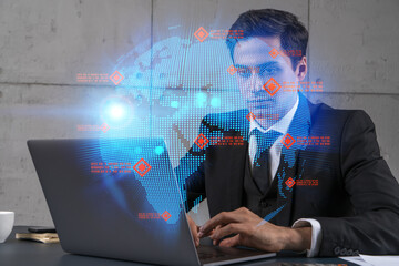 Businessman in office working with laptop, world map planet earth hologram, typing computer. Double exposure.