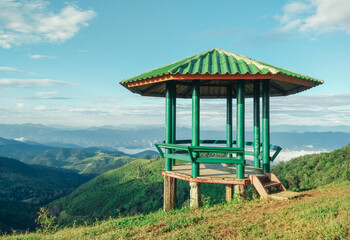 Fototapeta na wymiar The octagonal pavilion with green open-air is located on the hill It is a viewpoint before reaching the top of Pui Ko Mountain, Mae Hong Son, Thailand.