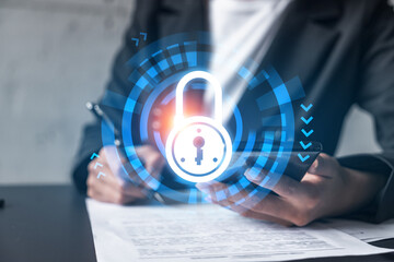 Lock icon hologram and a woman signing contract use phone. Security concept. Double exposure.