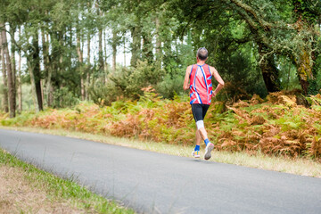 Fototapeta premium middle-aged man running in nature