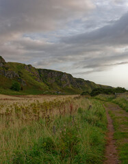 Fototapeta na wymiar The Footpath and track leading to Ecclesgreig Burial ground at the foot of the dramatic Cliffs in the St Cyrus National Nature Reserve.